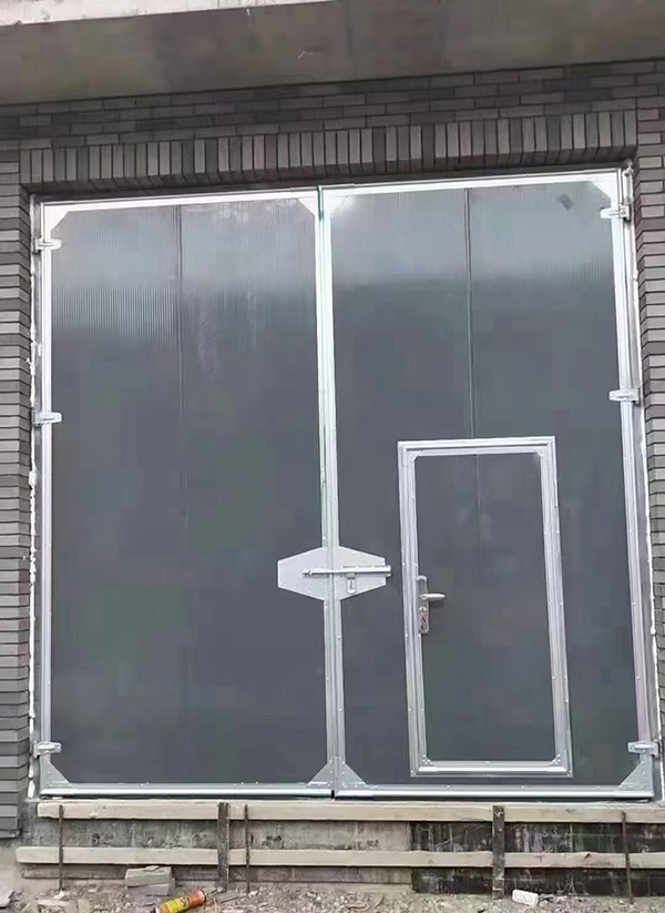 张掖工业平开门在大型设备制造车间的应用实例